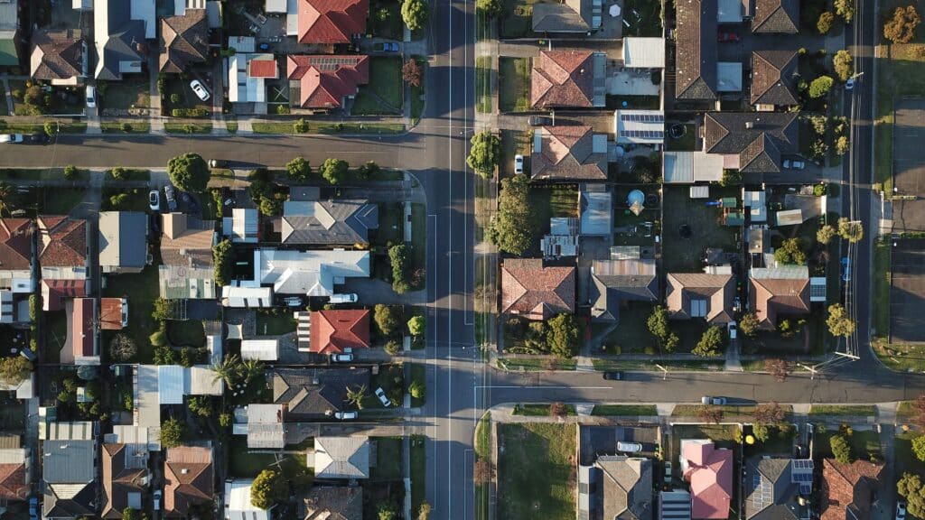 Bird eye View of a town with streets and houses.